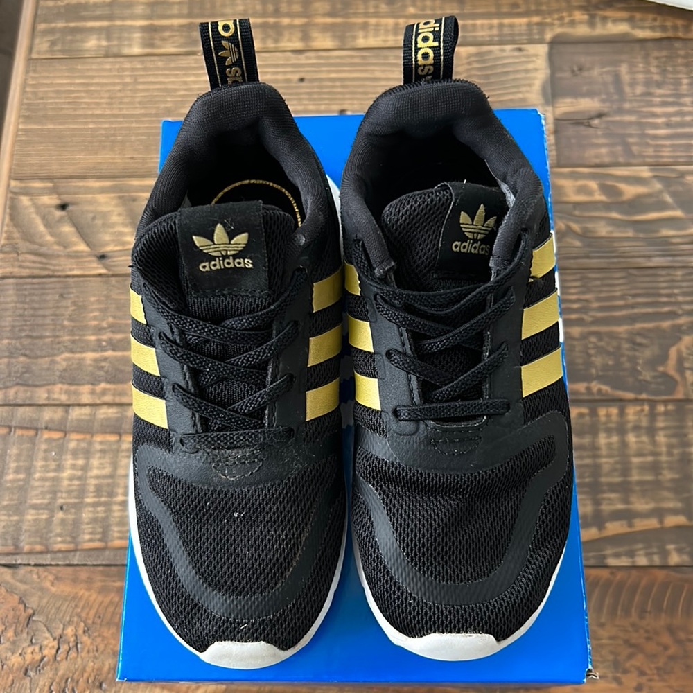 Adidas Multix EL I size 9 toddler black and gold sneakers